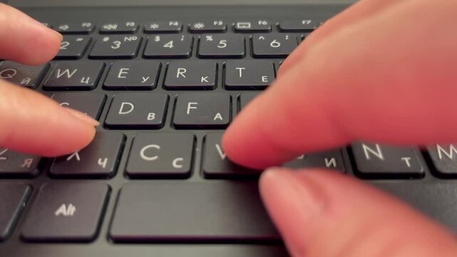 typing on a keyboard