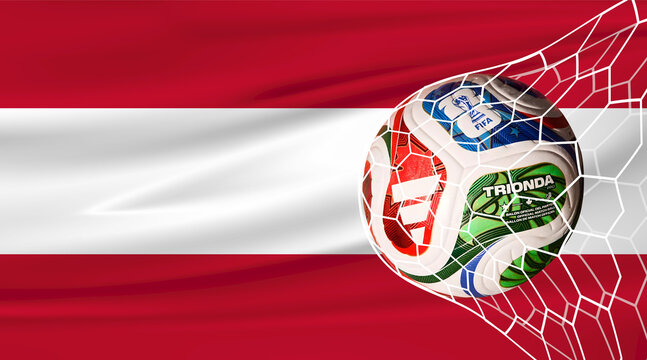 Karachi, Pakistan, 1 May 2026. Football in the net with the flag of Austria. FIFA World Cup 2026. Horizontal Realistic waving flag. Soccer or football tournament. 3d Stock Illustration.