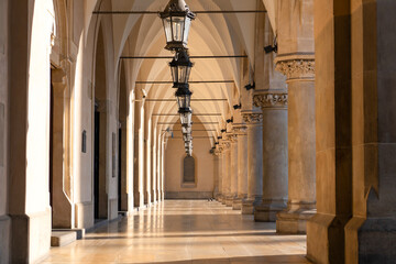 Kraków Sukiennice Cloth Hall gothic arcades in the early morning hours, Sukiennice, Krakow Main Market Square, Krakow Old Town, Krakow, Poland © Aneta