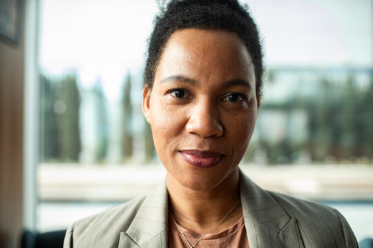 Confident businesswoman portrait in modern office
