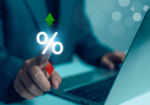 Businessman analyzing percentage rate increase and decrease on digital interface, financial interest, investment growth, inflation, tax and economic business technology concept