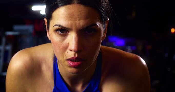 Slow Motion Of Woman Riding Exercise Bike In Gym, Concept Of Cardio Training And Personal Growth
