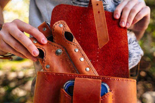 Open brown leather belt pouch