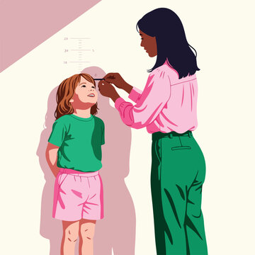 Woman measures happy child's height on a wall chart, marking growth with a ruler