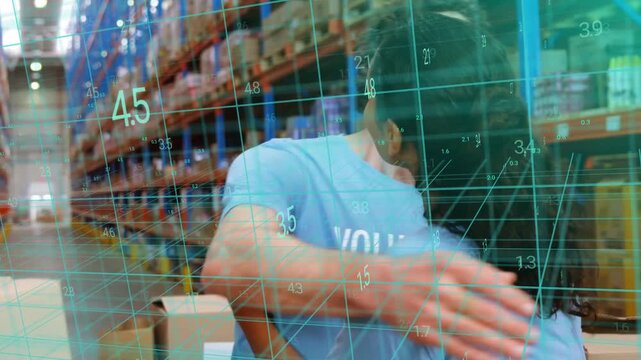 Two volunteers hugging conversing gesturing and checking with teal grid overlaying warehouse racks