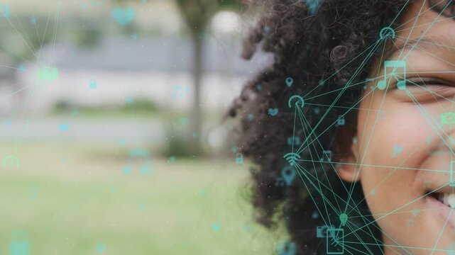 Camera zooming on smiling boy, tech overlay growing into icon mesh over cheek, showing connection