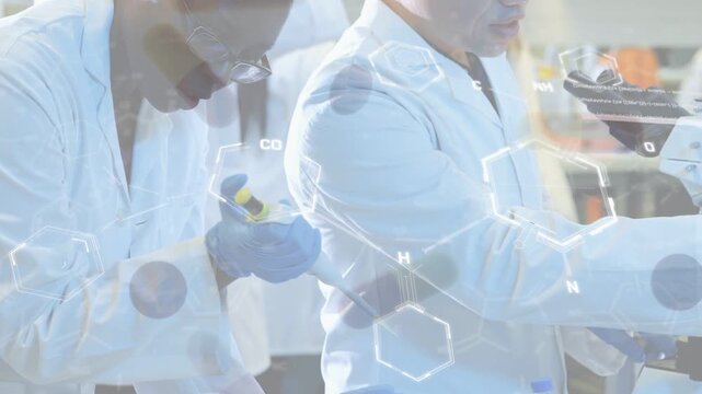 Left tech pipetting, right tech at scope, pipette motion sparking molecular overlays for lab assay
