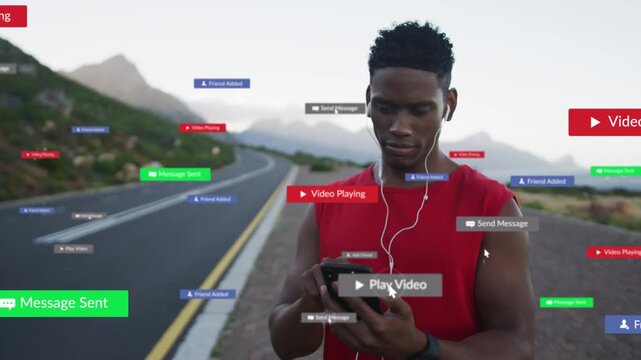 Man standing on coast road tapping phone UI popping urging play button while checking social feed
