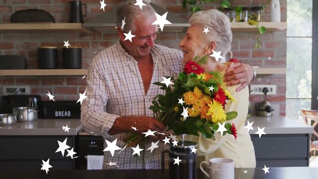 Man giving bouquet in kitchen while woman with French press, stars floating, couple sharing joy