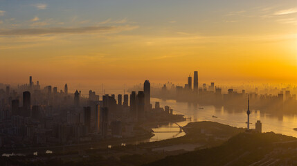 Naklejka premium Sunrise over the skyline of Wuhan, Hubei, China