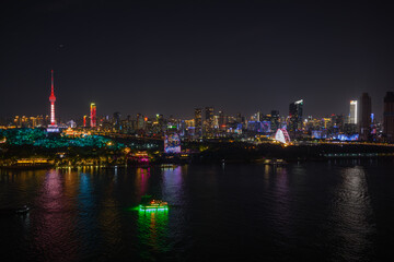 Fototapeta premium Night view of Wuhan, Hubei, China's city skyline and landmarks