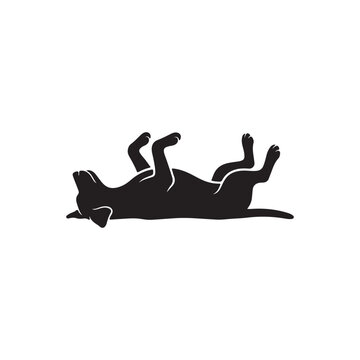 Black silhouette of a dog lying on its back with paws in the air white lying down des
