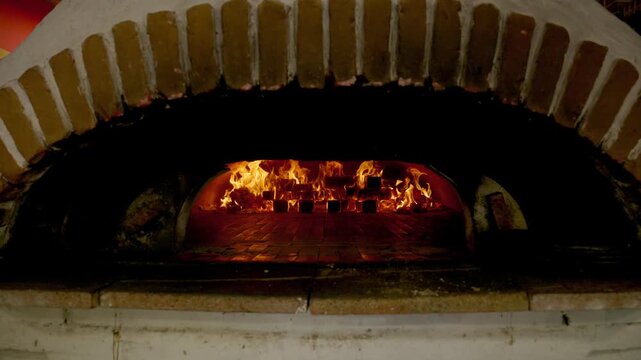 A brick oven (or masonry oven) is a traditional, typically dome-shaped cooking chamber constructed from heat-retaining materials like firebrick or concrete