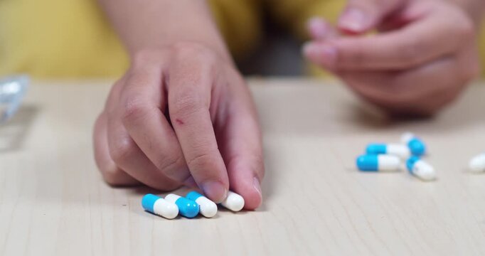 This tutorial showcases process of sorting medication capsules for better organization.