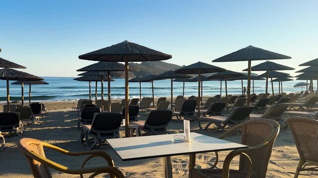 blue chair on Agia Marina beach, Crete Greece, toned