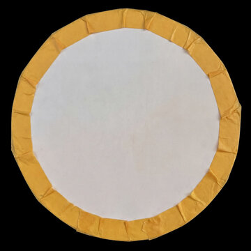 Round White Paper Circle with Yellow Tape Border Isolated on Black Background
