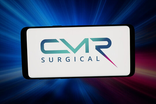 Stuttgart, Germany - 04-27-2026: In this photo illustration, the logo of medical device company CMR Surgical Ltd. is displayed on a smartphone in front of abstract background on computer screen.