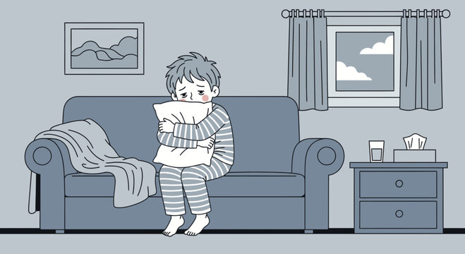 A Young Person Overcome With Sadness While Seated Alone on a Sofa Indoors