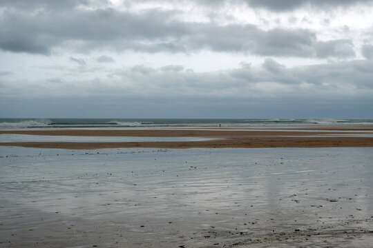 Perranporth seaside resort with sandy beach on a cloudy winter day. Photo taken February 2nd, 2026, Perranporth, Cornwall, United Kingdom.