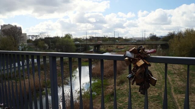 Love locks on a bridge over the Cybina channel. Poznan, Poland.