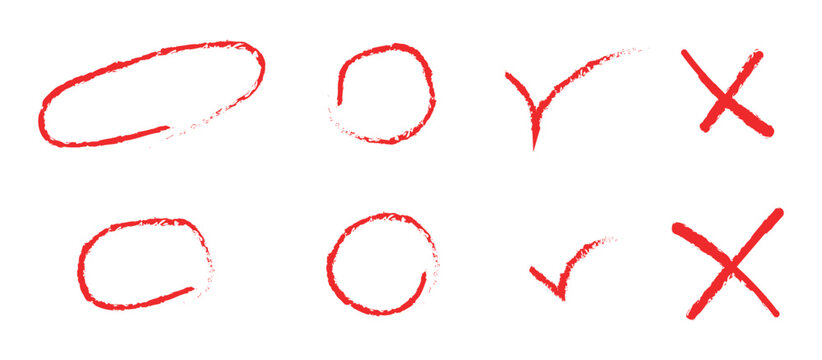Hand drawn red marker marks set including circles check marks and crosses for grading and correction.