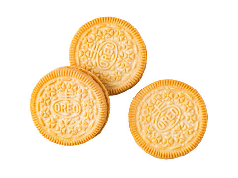 Golden oreo sandwich cookies pile on transparent background