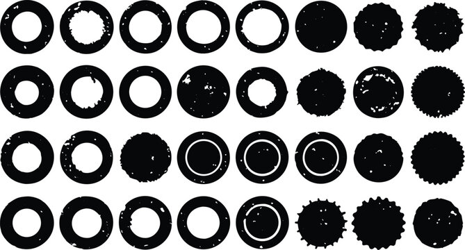Collection of black circular and cogged shapes with distressed edges and internal white circles ring