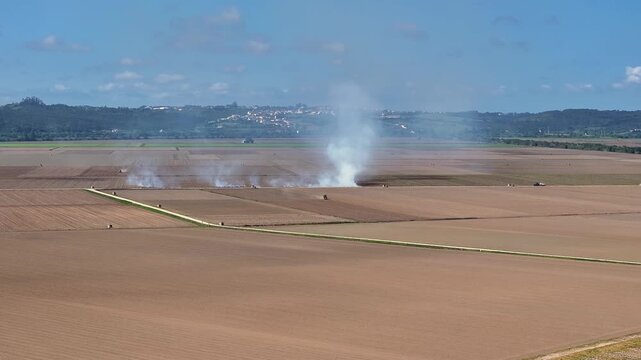 Farmers conduct agricultural burning to manage dry land and reduce wildfire risks amid climate crisis impacts in a drought-stricken area