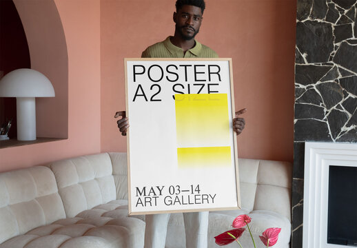 Mockup Of Man Holding Customizable A2 Poster
