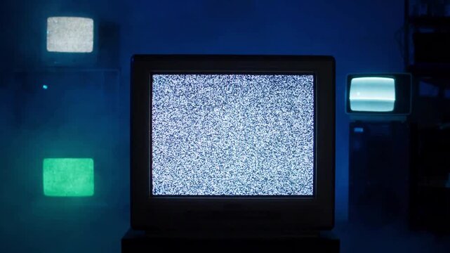 Vintage CRT Televisions with Static Noise in Dark Room