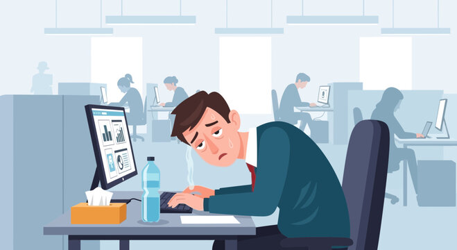 Exhausted Office Worker Stressed and Overworked at the Computer Desk in the Office
