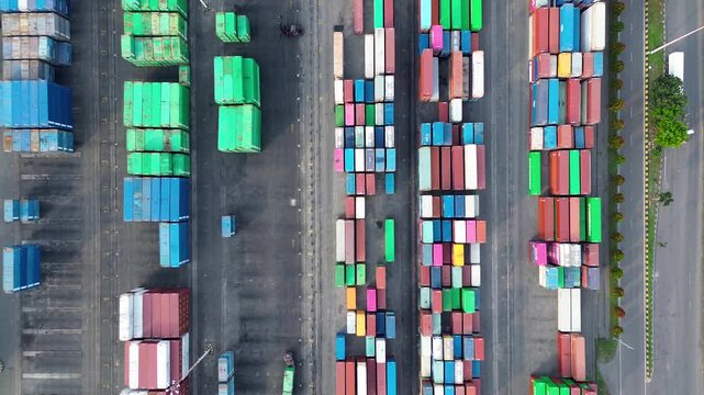 Industrial freight container depot and logistics infrastructure from aerial top view