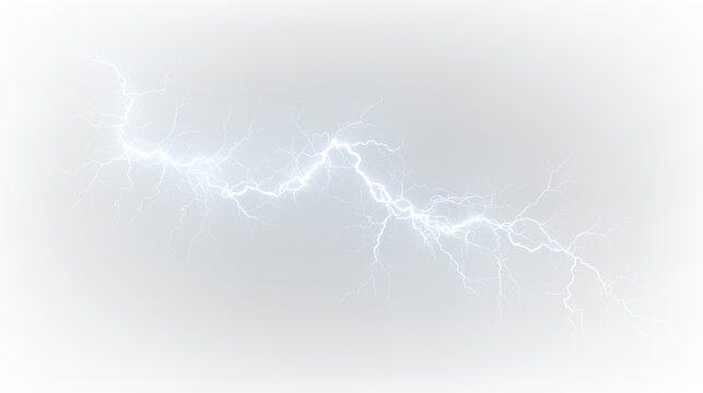 Lightning bolt striking from dark clouds during a thunderstorm in an open field at twilight near a forest