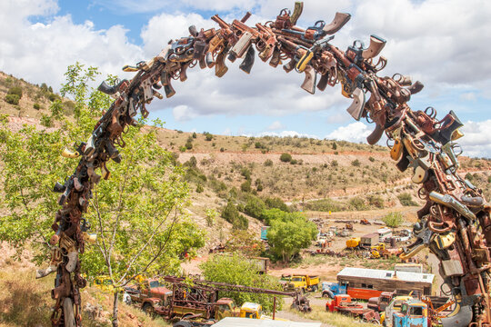 Ghost Town in Jeremy, Arizona with old cars, trucks and mining equipment and old buildings