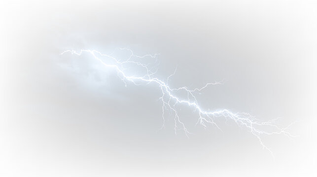 Lightning bolt strikes down from dark clouds during a storm in the midday sky