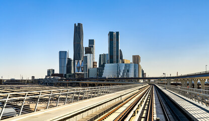 Fototapeta premium View of the King Abdullah Financial District skyscrapers from the metro railway tracks in Riyadh, Saudi Arabia.