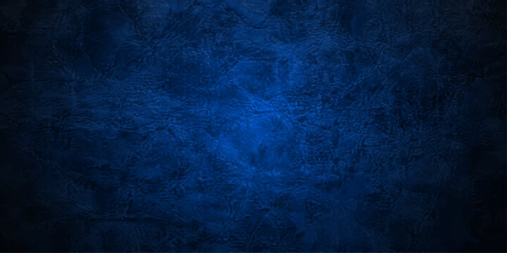 A dark blue grunge paper texture background features a vintage aged wall pattern with a rough dirty surface design suitable for a black chalkboard backdrop or old metal board wallpaper