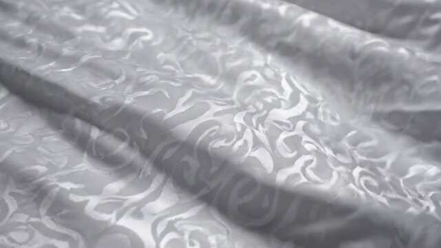 White Damask Fabric Elegant Satin Texture Waving With Soft Folds And Luxurious Floral Motifs