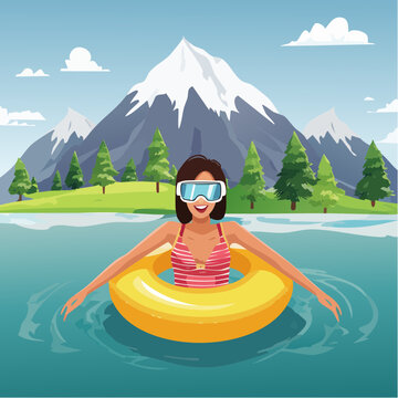 Woman Swimming with Goggles and Inflatable Ring in Mountain Lake