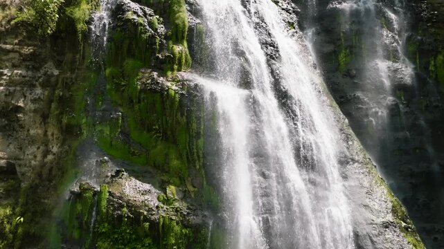 Waterfall in the mountains. Balea Falls in Slow motion. Negros, Philippines.