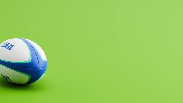 Rugby Ball Rolling Slowly from Left and Stopping on Clean Green Background with Copy Space. Then it rolls back.