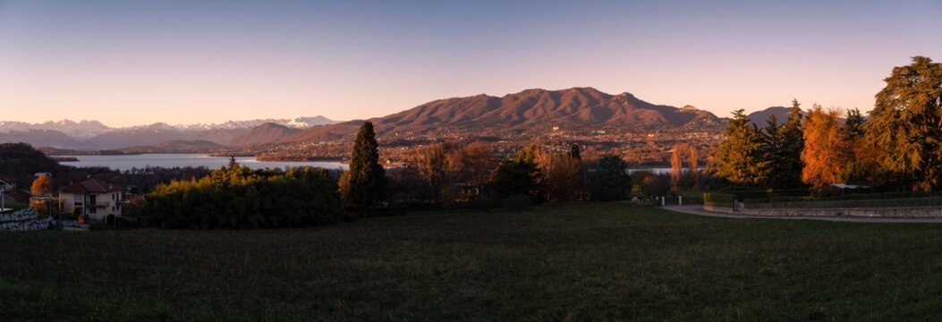 Sunset over the mountains and Varese lake in the north Italy