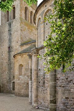Roman chevet of the Caunes-Minervois abbey with its typical stones