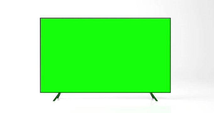 Focused flat screen smart TV mockup with green screen for compositing.