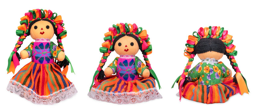 Three colorful handmade lele rag dolls from mexico on a transparent background
