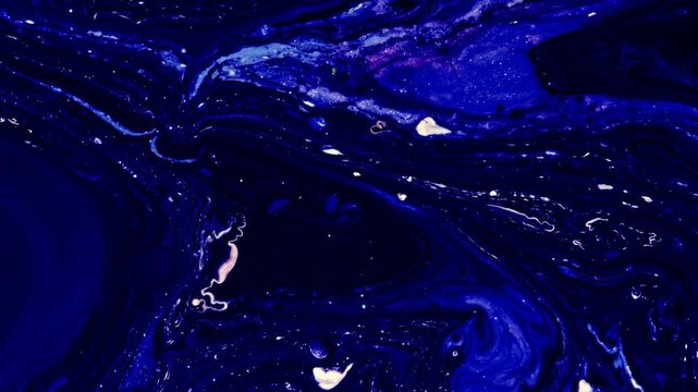 Underwater close-up footage of jellyfish swimming in deep blue ocean with bioluminescent glow