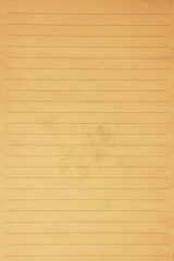 Fototapeta premium Brown notebook paper with stain texture