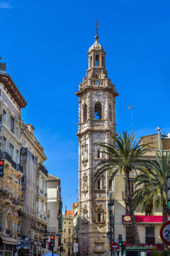 Santa Catalina church bell tower in Valencia, Spain. Vertical view, baroque architecture, clear blue sky, daylight
