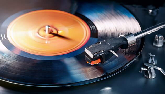 close up of a vinyl record playing on a turntable