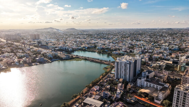 Aerial View Of Chennai City With Lakes And Golden Sunlight